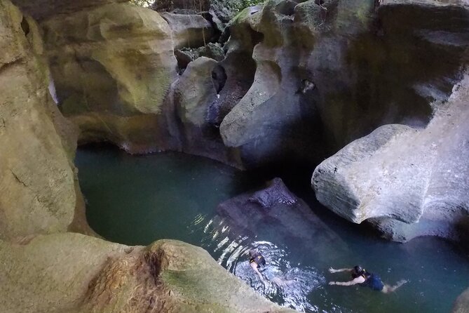 Cave Adventure - Charco Azul Caves, Canyon & Waterfall Adventure - Arenales Caves and underground rivers