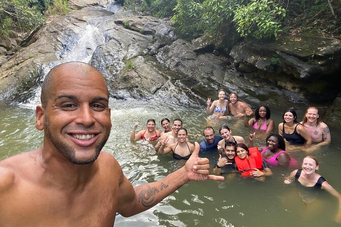 El Yunque & Beach Tour: Waterslide, Waterfall, Food, & Photos - A natural water slide instead of a theme-park ride