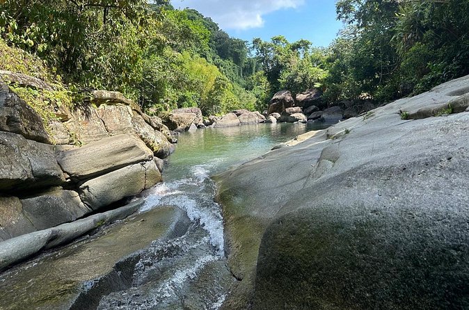 El Yunque & Beach Tour: Waterslide, Waterfall, Food, & Photos - River time, swimming, and the value of rain