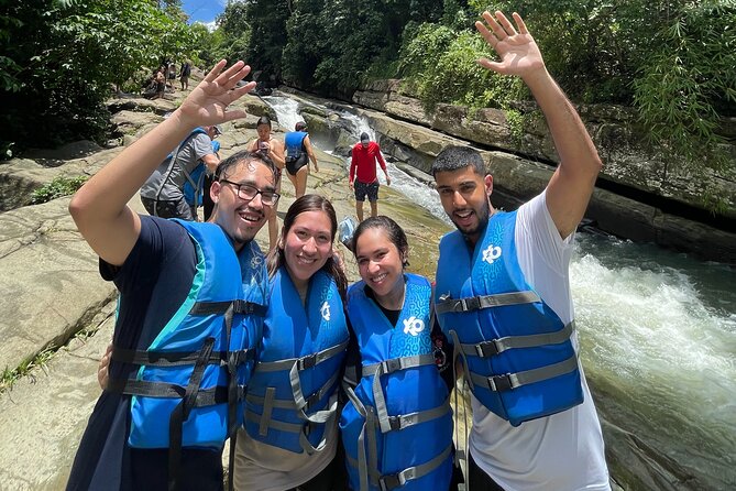 El Yunque Rainforest Tour with Waterslides and Beach - The river route: slides, pools, and wet rocks
