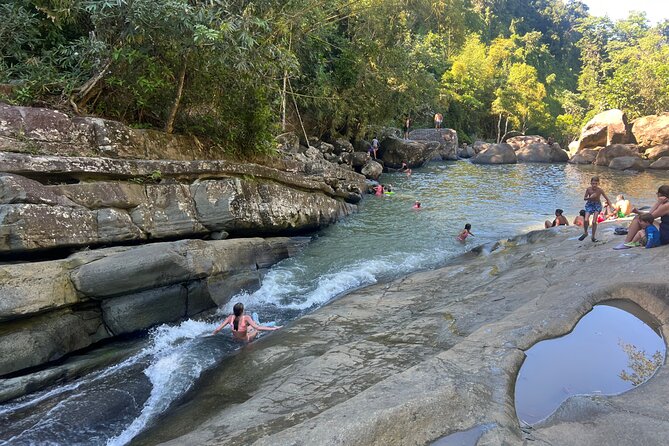El Yunque Rainforest- Water Slide, Luquillo Beach Guided Tour - Beginning in El Yunque with a short forest walk