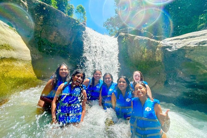 El Yunque: Waterslide and Plus Beach Round Trip - A rainforest thrill followed by beach time