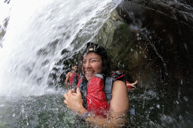 Half-Day: Rainforest and Waterslide Adventure with Transportation - Natural pools, waterfalls, and a rock slide