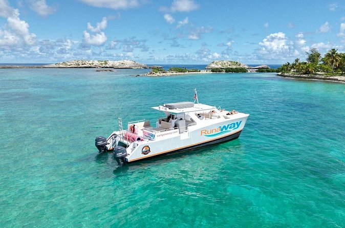Icacos Double Dip Power Catamaran Snorkel & Beach Tour - Lunch, rum drinks, and the move to the beach