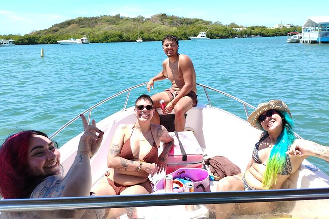 La Parguera Boat Charter with Captain: Kayak & Snorkel - Shore views, homes, and kite surfers