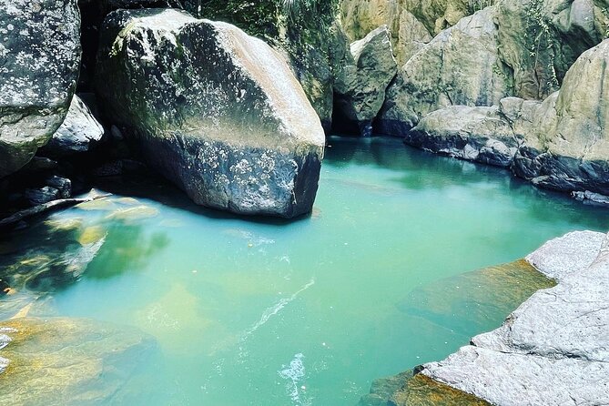 Private El Yunque Tour To Hidden Waterfall Remote Area - Local history adds meaning to the forest