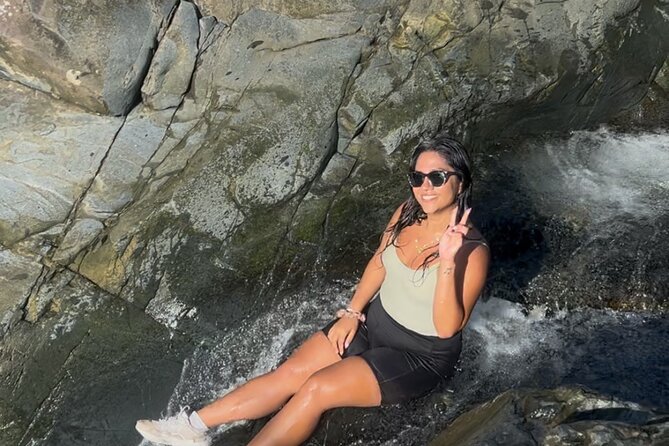 Private El Yunque Tour to Waterslide and Waterfalls - Swimming, rope swings, and natural rock slides