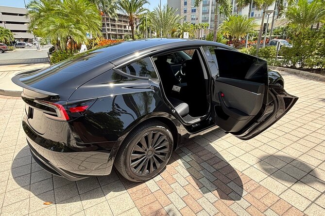 Puerto Rico Island Wide Private Transfers, Tesla 3 Luxury Sedan. - A calm start after the airport or cruise ship