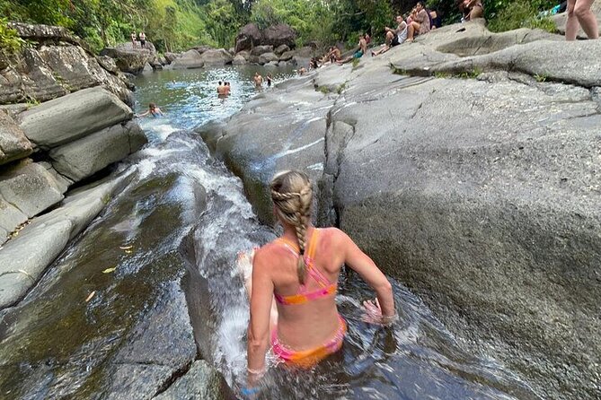 Rainforest Zipline, Luquillo Beach, and Natural Springs Day Trip - Natural springs and the rock water slide