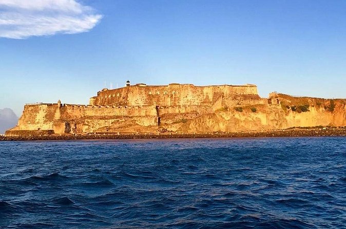 San Juan Catamaran Sunset Sail with Drinks Included - El Morro Fort and the San Juan Gate from the water