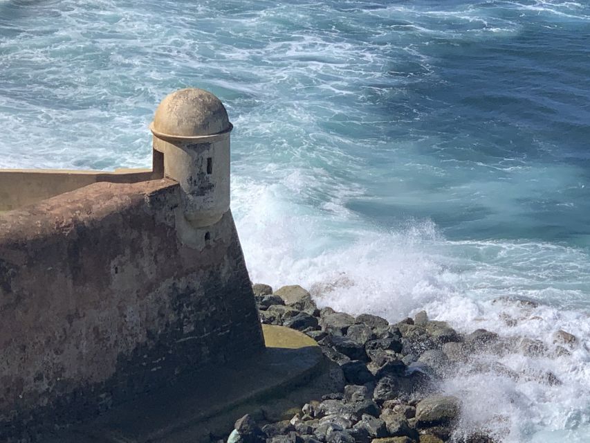 San Juan: Ghosts and Spooky History Walking Tour - Castillo San Felipe del Morro at the edge of the sea