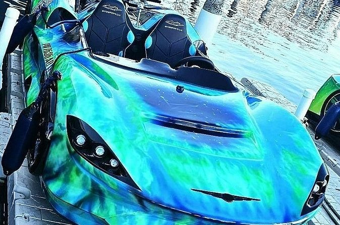 San Juan PR Watersports Car Rental Green McLaren - Cruising San Juan Bay toward Old San Juan